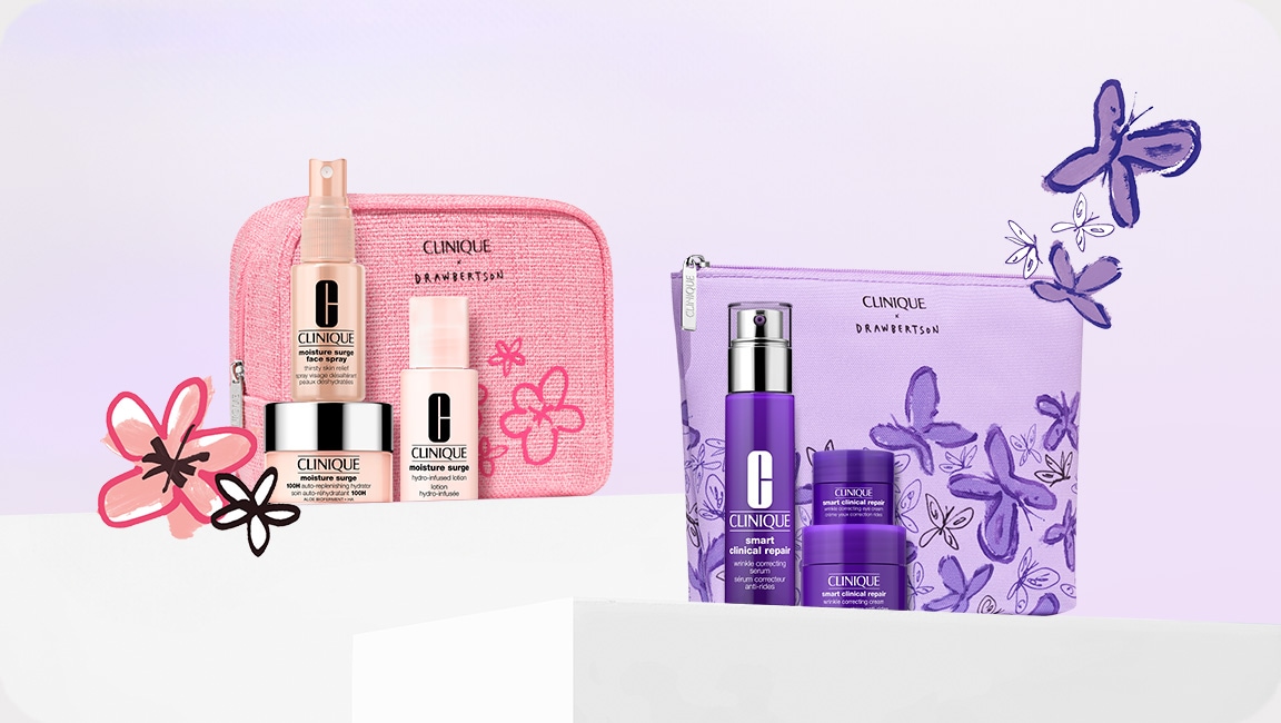 Selection of full-size Clinique products in front of a grey background, with black illustrated sparkles dotted around